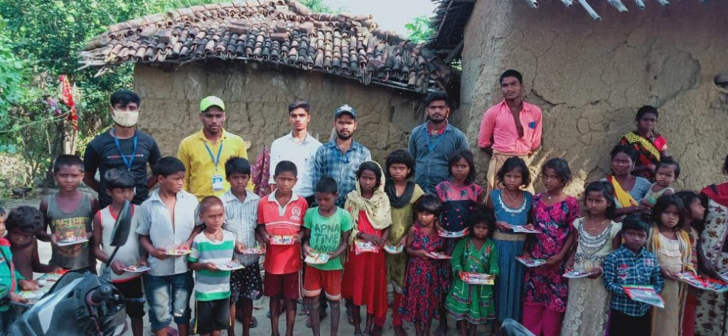 Bapu Seva Trust Volunteers with village children